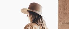 JANESSA LEONE - Brown Packable Straw Fedora - Adriana Chic Brown Brimmed Boater Hat, Chic Flat Brim Fedora For Rodeo, Chic Fedora With Flat Brim For Rodeo, Chic Brown Boater Hat With Short Brim, Casual Wide Brim Top Hat For Spring, Chic Brown Short Brim Boater Hat, Chic Everyday Brimmed Panama Hat, Everyday Chic Brimmed Panama Hat, Chic Rodeo Hat