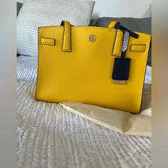 Brand New Tory Burch Walker Small Satchel In Goldfinch Never Worn. Tags On. Duster Included. Perfect Bag For Spring. Classic Yellow Shoulder Bag With Handles, Classic Yellow Shoulder Bag, Yellow Satchel With Top Carry Handle For On-the-go, Elegant Yellow Bag With Branded Hardware, Elegant Yellow Bags With Branded Hardware, Designer Yellow Satchel With Removable Pouch, Classic Yellow Shoulder Bag With Top Carry Handle, Classic Yellow Satchel With Top Carry Handle, Yellow Leather Shoulder Bag With Branded Hardware