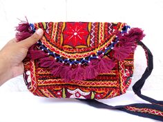 Maroon tassel blue beads crossbody bag, Indian hand embroidery sling purse, broad sling mirror work bag, bohemian banjara bag, gift for her by craftcoloursindia on Etsy Bohemian Clutch Bag With Tassels, Bohemian Tassel Clutch Bag, Bohemian Tassel Clutch Shoulder Bag, Bohemian Clutch Shoulder Bag With Tassels, Bohemian Pouch Shoulder Bag With Tassels, Traditional Potli Bag With Tassels For Festive Occasions, Traditional Festive Potli Bag With Tassels, Bohemian Clutch With Handwork, Bohemian Clutch Shoulder Bag For Festivals