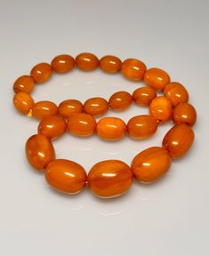 86 Grams Antique Bakelite Necklace Beads Marbled.           Very quality necklace with olive shape. All beads have rich veins. 25 total beads Biggest bead sizes 25.50 x 21 mm.  Smallest bead sizes 17 x 13.40 mm. For any questions feel free to as Amber Necklace With Faceted Oval Beads, Amber Oval Beads Single Strand Necklace, Amber Necklaces With Polished Oval Beads, Amber Oval Beaded Necklaces For Jewelry Making, Amber Oval Beads Necklace For Jewelry Making, Amber Single Strand Necklace With Oval Beads, Amber Beaded Necklaces With Large Oval Beads, Amber Beaded Necklace With Large Oval Beads, Bakelite Necklace