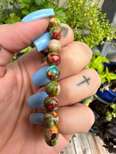 Jasper(8mm beads) burlap gift bag included  Jasper: in all its forms, is considered a powerful healing stone. Jasper is regarded as a gemstone that gives a sense of well-being, intensifying that feeling  ♡ Choosing your bracelet size: an average female bracelet size is 7 inches, and for a male 8inches. For the best fit please measure your wrist with a tape measure and add 1/2 inch to your measurement. If you don't have a tape measure just use a piece of yarn and then measure with a ruler. Know t Unique Hand-strung Beads For Gifts, Spiritual Wooden Beaded Healing Bracelets, Turquoise Bracelet With Wooden Beads, Turquoise Bracelet With Wooden Beads For Gift, Spiritual Beaded Stretch Bracelet As Gift, Spiritual Wooden Beads Jewelry For Healing, Holistic Wooden Beads Healing Bracelet, Earthy Wooden Beads As A Gift, Turquoise Stretch Bracelet With Wooden Beads Gift