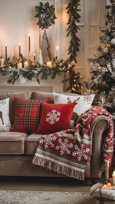 a living room filled with furniture and christmas decorations