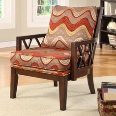 a chair that is sitting in front of a book shelf with books on top of it