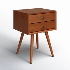 a small wooden table with two drawers on one side and three legs on the other