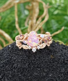 Pear shaped Pink opal engagement ring set Vintage Rose gold Leaf Moonstone Bridal set Filigree Diamond wedding ring women Anniversary ring The engagement ring: ❥Center Stone: Gemstone: Lab Pink Opal Shape: Pear shaped cut Size: 6.0x8.0 mm ❥Side Stones: Gemstone: Moonstone & Amethyst Carat total weight: about 0.11ct ❥Ring Dimensions Band width: 1.60mm Band thickness: 1.20mm The wedding band: ❥Stones: White Stones: Natural Diamonds or Moissanite Carat total weight: about 0.08ct ❥Ring Dimensions Ba Exquisite Multi-stone Opal Wedding Ring, Pink Gold Birthstone Jewelry For Wedding, Rose Gold Wedding Jewelry With Accent Stones, Rose Gold Jewelry With Accent Stones For Wedding, Pink Gold Wedding Jewelry With Round Cut, Pink Gold Jewelry For Wedding With Round Cut, Pink Gold Wedding Jewelry With Accent Stones, Rose Gold Pink Opal Jewelry For Wedding, Rose Gold Pink Opal Round Jewelry