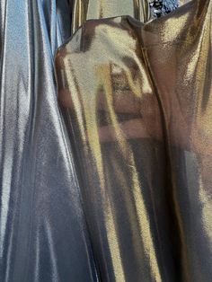 metallic chiffon fabric sold by yard  see through fabric  fabric is not stretchy  2 colors available Silver on black Gold on black Measurements: fabric width - 60" Futuristic Fabric, Techno Club, Fabric Board, Band Ghost, Metallic Fabric, Metallic Foil, Teaching Materials, Fabric Width, Chiffon Fabric