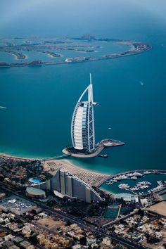 an aerial view of the burj al arab hotel in abu, united kingdom