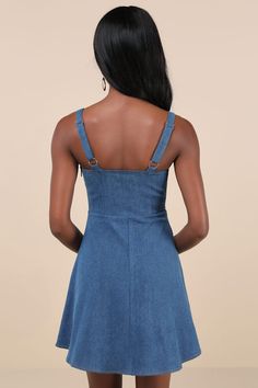 The cuties will all come running when they see you in the Lulus Considered Charisma Blue Chambray Bustier Mini Dress! Stretchy chambray fabric shapes this oh-so-adorable dress that has wide adjustable straps and a gathered bust with a sweetheart neckline and a front tie detail. Corset-style seamed paneling lines the bodice, culminating in an angled Basque waist. Flaring skirt falls to a mini hem. Hidden zipper/clasp at side. Fit: This garment fits true to size. Length: Mid-thigh. Size medium mea Medium Wash Sleeveless Denim Dress With Adjustable Straps, Fitted Denim Blue Spaghetti Strap Dress, Denim Blue Fitted Dress With Spaghetti Straps, Fitted Denim Dress With Adjustable Straps For Spring, Medium Wash Cotton Dress With Adjustable Straps, Denim Blue Sleeveless Dress With Adjustable Straps, Summer Sleeveless Denim Dress With Adjustable Straps, Fitted Denim Blue Denim Dress With Adjustable Straps, Blue Fitted Mini Dress With Adjustable Straps