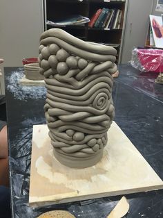 a large vase sitting on top of a table