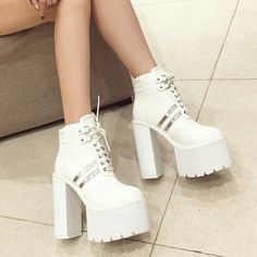 Department Name: Adult Item Type: Boots With Platforms: Yes Heel Height: Super High (8cm-up) Outsole Material: Rubber Insole Material: PU is_handmade: Yes Heel Type: Square heel Platform Height: 5-7cm Closure Type: Lace-Up Toe Shape: Round Toe Fashion Element: Platform Season: Spring/Autumn Boot Type: Basic Boot Height: Ankle Pattern Type: Solid Heel Height: 15cm Leather Style: Soft Leather Platform Height: 5.5cm Party High-top Chunky Platform Heeled Boots, High-top Chunky Platform Heeled Boots For Party, Chunky Platform Lace-up Boots For Party, White High Ankle Platform Boots, White Pointed Toe Platform Boots For Winter, Platform Martin Boots With Round Toe For Party, Party High-top Chunky Platform Boots, White Pointed Toe Platform Boots For Fall, Trendy Platform Boots With Metal Feet And Pointed Toe