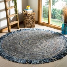 a round rug in the middle of a room