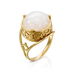 A beautiful 14k Yellow Solid Gold Moonstone Ring, a luxurious piece of jewelry that exudes royalty and elegance. This ring features a stunning cabochon-cut moonstone, hand-selected for its quality and natural beauty. The soft, creamy color of the moonstone is accented by the warm, rich glow of the 14k yellow solid gold setting, creating a harmonious blend of style and grace. The cabochon cut of the moonstone creates a smooth and rounded surface, showcasing the unique and natural patterns within Gold Butterfly Ring, Gold Moonstone Ring, Gemstone Rings Vintage, Creamy Color, Natural Patterns, Royal Look, Diamond Jewelry Designs, Cabochon Ring, Gemstones Jewelry