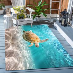 a turtle swimming in the ocean on a rug