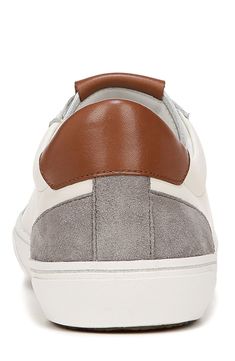 Polished leather accents the tongue and heel of a sneaker shaped from premium suede with a low lace-to-toe profile and bright cupsole keeping things sporty. Lace-up style Leather upper/leather and textile lining/rubber sole Imported Men's Shoes Sporty Leather Slip-on Sneakers With Contrast Sole, White Suede Skate Shoes With Cushioned Footbed, Classic Leather Lace-up Skate Shoes, Custom Leather Low-top Sneakers With Cushioned Footbed, White Mid-top Suede Sneakers, White Suede Mid-top Sneakers, Casual Leather Skate Shoes With Contrast Sole, Suede Cushioned Lace-up Skate Shoes, Leather Sneakers With Contrast Sole And Lace-up