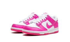 The Nike Dunk Low GS “Laser Fuchsia” is the youth sizing of the retro basketball shoe in an eye-catching, two-tone colorway.  The upper has a white leather foundation and is contrasted with Laser Fuchsia leather overlays.  The neon pink hue also appears on the leather Swoosh on each side of the shoe, and on the “Nike” embroidery on the heel and “Nike” and Swoosh logos on the tongue tag.  A white midsole and Laser Fuchsia outsole complete the look.  Release date: April 12, 2023 Fuchsia Shoes, Cute Jordans, Nike Embroidery, Custom Shoes Diy, Retro Basketball Shoes, Retro Basketball, Tenis Nike, Old Shoes, Aesthetic Things