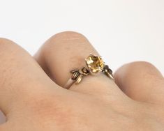 *This item is MADE TO ORDER- please allow one to two weeks for me to make your custom bee ring.* SIZE: 5 x 7mm natural faceted oval citrine stone in a solitaire prong setting (first option), OR, 4mm round rose cut bezel (second option). Requests for all other gemstones are welcome! Other stock options here: https://etsy.me/2AqhUrt PRODUCT INFO AND PROCESS: I create the sterling silver ring band and mount for each of these using traditional silversmithing techniques, then solder on the tiny brass Citrine Ring Engagement, Silver Ring Band, Bee Ring, Alternative Engagement Ring, Second Option, Bee Jewelry, Stock Options, Sterling Silver Rings Bands, Citrine Stone