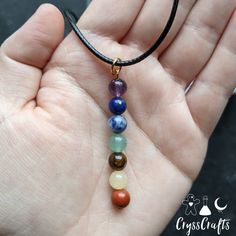 This natural Chakra stone drop pendant necklace is perfect for balancing and recharging your chakras. This necklace features 7 natural stones to represent each chakra (amethyst, lapis lazuli, sodalite, green aventurine, tigers eye, yellow Jade, and red Jasper) Pendant is hung on wax coated thread with a lobster claw clasp closure. Lapis Lazuli Crystal Necklaces For Jewelry Making, Gemstone Pendant Charm Necklace For Meditation, Lapis Lazuli Crystal Necklace For Jewelry Making, Spiritual Gemstone Pendant Beads, Rainbow Crystal Necklace With Natural Stones, Multicolor Spiritual Charm Necklaces For Gift, Handmade Lapis Lazuli Crystal Necklaces For Healing, Handmade Spiritual Lapis Lazuli Crystal Necklace, Spiritual Multicolor Pendant Charm Necklaces