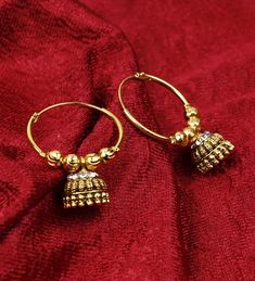 Combo of 3 Pair Of Earrings. Perfect with ethnic & traditional wear. Fancy Party Wear Traditional Jhumki Earrings. Perfect gift for any occasion for yourself and your dear ones. It is advisable to store jewellery in a zip lock pouch (air tight pouch), keep away from water perfume and other chemicals and clean it with dry and soft cloth. Bollywood Style Round Hoop Earrings With Meenakari, Bollywood Style Heavy Hoop Earrings, Bollywood Style Tilla Hoop Earrings For Festivals, Bollywood Style Heavy Hoop Earrings As Gift, Festive Round Danglers For Puja, Heavy Temple Jewelry Hoop Earrings, Cutdana Jhumkas For Puja, Bridal Meenakari Earrings For Puja, Meenakari Earrings For Puja