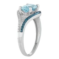 Adorned with a genuine blue topaz center stone accented with blue and white diamonds, this sterling silver ring lends a touch of sparkle to your look.RING DETAILSWidth: 10.9 mmMetal: sterling silverPlating: rhodiumFinish: polishedPackaging: boxedSTONE DETAILSStone type: blue topazTotal weight: 2 1/5 ct.Center stone size: 9 mm x 7 mmShape: ovalSetting: prongDIAMOND DETAILSTotal weight: less than 1/10 ct.Shape: roundColor grade: H-IClarity: I2-I3Setting: prongGemstones may have been treated to enh Light Blue Topaz Ring With Diamond Accent Stones, Turquoise Blue Topaz Ring With Center Stone, Oval Blue Diamond Ring With Pave Setting, Fine Jewelry Blue Topaz Ring In Diamond White, Blue Topaz Jewelry With Pave Setting For Anniversary, Diamond White Blue Topaz Ring Fine Jewelry, Blue Oval Birthstone Ring With Diamond Accents, Fine Jewelry Light Blue Topaz Ring With Diamond Accents, Blue Diamond Ring With Gemstone Accents For Promise