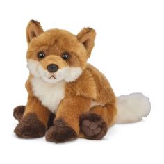 a small stuffed fox sitting on the ground