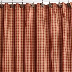 a red and white checkered curtain with stars on it