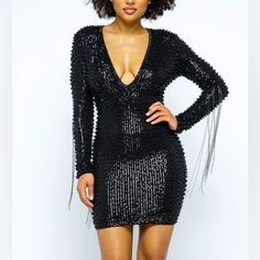 This Best Seller Black Pearl Beaded Dress Is A True Knockout This Deep V-Line Neck Plunges Into A Sea Of Beaded Sequins, Pearls And A Hint Of Metal Fringe. The Metallic Threads Are Black Tones But May Easily Be Paired With Gunmetal Or Antique Jewelry Sequins Dress Small Medium Large Pearl Dress Deep V-Neck Plunging Metal Fringe On Sleeves Mini Dress Stretch Lining Long Sleeves Back Zipper 48%Polyester 40%Pet 12%Spandex Fully Embellished Black Pearl Metallic Chain Long Sleeve Stunning Formal V Ne V-neck Party Dress With Beaded Fringe, Embellished V-neck Bodycon Party Dress, Black Sequined Bodycon Evening Dress, Black Embellished V-neck Mini Dress, Glamorous Beaded Fringe Dress For Date Night, Embellished V-neck Bodycon Cocktail Dress, V-neck Embellished Bodycon Cocktail Dress, Elegant Beaded Fringe Dress For Date Night, Black V-neck Mini Dress With Contrast Sequin