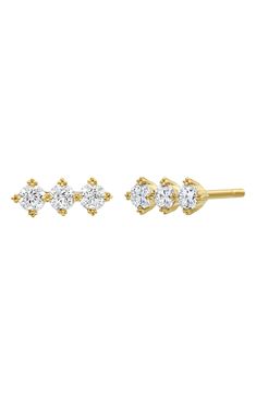 A trio of three brilliant white diamonds lights up each stud in this stunning pair of earrings handcrafted from 18-karat gold. 1/4" width Post back Total diamond weight: 0.3ct. Color: G Clarity: VS 18k gold/diamond Imported >Diamond Guide Elegant Yellow Gold Diamond Ear Climbers, Elegant Gold Ear Climbers With Prong Setting, Three Stone Diamond Earrings In Yellow Gold, Yellow Gold Cubic Zirconia Ear Climbers With Diamond Accents, Yellow Gold Diamond Ear Climbers For Formal Occasions, Formal Yellow Gold Diamond Ear Climbers, Elegant 14k Gold Ear Climbers With Prong Setting, Yellow Gold Diamond Ear Climbers For Wedding, Elegant Yellow Gold Three Stone Earrings