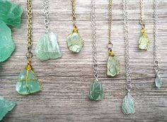 △ 💎GREEN FLUORITE 🌿💚 ☁ Gorgeous, raw green fluorite crystal pendant necklaces.  Each pendant is wire wrapped by hand, with love. Choices of gold or silver wrap, & size of crystal.  The colours of the fluorite range from pale mint, to deep forest green.  Each pendant comes on a chain, with lobster claw closure. (chain 45cm /pendants range in size & price: XS approx 2cm, 1-2.5g/ S 2.5-3cm, 6.5-8g/ M 3.5-4cm, 10-12g/ L 4-4.5cm, 16-26g) ---------------------------------------------------------------------------------------------------------- ⟁ other crystal/ gemstone necklaces available in the shop: ⟁ https://www.etsy.com/ca/listing/711375128/crystal-necklace-citrine-necklace?ref=shop_home_active_9&pro=1&frs=1 ⟁ https://www.etsy.com/ca/listing/711589536/crystal-necklace-pastel-aesthetic-ang Citrine Crystal Necklace, Green Fluorite Crystal, Raw Crystal Pendant, Wanderlust Jewelry, Deep Forest Green, Witch Gift, Citrine Necklace, Green Fluorite, Fluorite Crystal