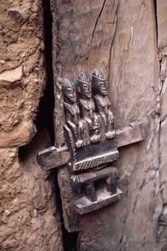 an old wooden door with carvings on it