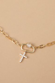 The delicate paperclip chain adds a modern edge, while the sparkling rhinestone cross pendant offers a symbol of faith. Perfect for layering with other necklaces or on its own, this necklace is a versatile must-have. Cross Layered Necklace, Stacked Jewelry Necklaces, Necklace Stacking, Faith Apparel, Cross Charm Necklace, Necklace Stack, Preppy Jewelry, Grandmas Christmas, Faith Jewelry