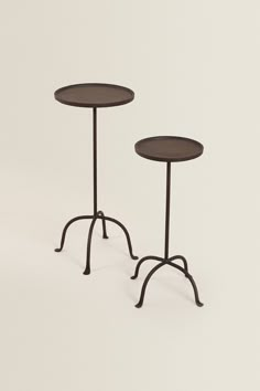 two small tables sitting on top of each other