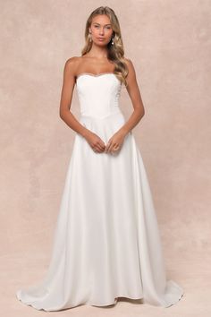 Your special someone will always cherish the moment they first saw you in the Lulus Eternal Gratitude White Floral Embroidered Strapless Maxi Dress! This gorgeous dress has a woven satin construction that shapes a strapless, bustier-style bodice with supportive boning and a sweetheart neckline with sheer ruffled trim (and hidden no-slip strips). The Basque-inspired waist sits atop a cascading A-line skirt that falls to a maxi hem with a romantic train at the back. Matching, sheer tulle mesh acce White Maxi Dress Wedding, Maxi Dress Strapless, Strapless Bustier, Embroidered Maxi Dress, Strapless Maxi, Maxi Dress Wedding, Cup Sizes, Wedding Vibes, Strapless Maxi Dress