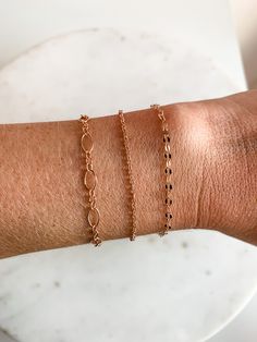 Now offering Permanent Jewelry at our shop, Catalyst Mercantile located at 117 N Main St, Mount Holly 28120! Treat yourself to dainty, high quality jewelry you never have to take off. Choose between 14k Gold Fill, 14k Rose Gold Fill, or Sterling Silver and have a bracelet, anklet or even a necklace made custom for you! What is Permanent Jewelry? It is a dainty everyday custom bracelet or anklet that is micro welded to your wrist to give you a totally seamless bracelet. It is a quick, fun, and to Dainty Tarnish Resistant Rose Gold Bracelet, Dainty Rose Gold 14k Gold Filled Bracelets, Dainty 14k Gold Filled Rose Gold Bracelet, Dainty Rose Gold Bracelet, 14k Gold Filled, Rose Gold Satellite Chain Bracelet As Gift, Stackable Rose Gold Bracelets In 14k Gold Filled, Dainty Rose Gold Jewelry With Jubilee Bracelet, Dainty Rose Gold Stackable Bracelets, Dainty Rose Gold 14k Gold-filled Chain Bracelet