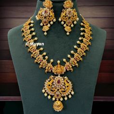 Guttapasullu necklace with earring/Godess laxmi & peacock gold plated temple jewelry/Traditional indian jewelry/South Indian wedding set  All orders Ship same day if placed before 4:00 PM EST  Necklace length: 16-20 inch adjustable length. Create beautiful memory for any occasion with elegant jewelry for your loved ones We will be happy to navigate you through the process so if you have any questions regarding our product before placing an order reach out to us and we will be there to help you. Gold Plated Chandbali Temple Jewelry Sets, Diwali Temple Jewelry Bridal Necklace In Gold Plated, Gold Plated Temple Jewelry Bridal Necklace For Diwali, Diwali Gold Plated Jewelry Sets With Latkans, Temple Jewelry Sets With Chandbali Shape And Latkans, Temple Jewelry Sets With Chandbali Latkans, Festive Temple Jewelry Sets In Gold Plated, Festive Gold Plated Temple Jewelry Sets, Gold Plated Chandbali Temple Necklace With Latkans