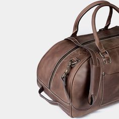 Vintage Travel Duffel Leather-handled Duffle Bag For Weekend Trips, Large Capacity Leather Weekender Bag For On-the-go, Luxury Rugged Leather Duffle Bag, Rectangular Leather-lined Duffle Bag For Overnight Trips, Luxury Leather-lined Duffle Bag For Travel, Leather Weekender Bag, Frequent Traveler, Vintage Leather Jacket, Laptop Pocket