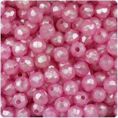 pink glass beads are shown in this image