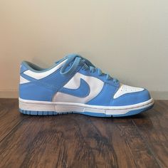 These Are The Nike Low Dunk University Blue. They Are Sized Big Boys 6.5 Youth. They Are Practically Brand New. They Have Only Been Worn Once. There Are No Scratches Or Tears. Light Blue Casual Skate Shoes With Boost Midsole, Light Blue Skate Shoes For Streetwear With Round Toe, Light Blue Round Toe Skate Shoes For Streetwear, Casual Light Blue Skate Shoes With Boost Midsole, Sporty Light Blue Low-top Skate Shoes, Light Blue Skate Shoes For Streetwear, Light Blue Leather Low-top Skate Shoes, Casual Blue Synthetic Skate Shoes, Casual Light Blue Leather Skate Shoes