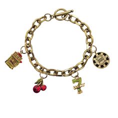 The perfect gift for any Slots player or Las Vegas enthusiasts! Our NEW Toggle Charm Bracelet is available in an antique gold or antique silver finish and features 4 coordinating, hand-painted, theme-specific charms, including Slot Machine, Cherries, Lucky 7 and $100 Casino Chip. Bracelet length is 7.0 inches and secures with toggle bar and clasp for easy, one-handed closure. Classic chain design is terrific on its own, layered with other bracelets, or with any of our handcrafted watches. Bracel