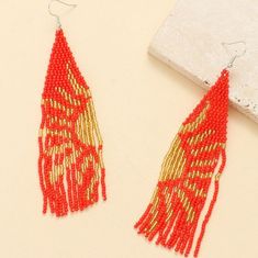 Approx 5" Handcrafted Red With Abstract Golden Sun Rays Design Bohemian Dangle Earrings More Colors Available, See Last Pic Boho Statement Jewelry Most Of My Other Earrings Are Dangle Types (Like These) That Can Be Upgraded To Solid Sterling Silver Or 14k Gold Filled Wires. I Have Some Extra Stainless Steel Wires And Gold Tone Wires Too. If You Want To Switch Out The Wires To One Of Those I Will Customize Them For You For Free. I Have A Background In Jewelry Design In Nyc And I Buy My Ear Wires Red Beaded Fringe Earrings For Summer, Red Festive Earrings For Summer, Red Beaded Earrings With Large Beads, Red Beaded Drop Earrings With Large Beads, Red Festive Dangle Beaded Earrings, Red Drop Beaded Earrings For Celebration, Red Beaded Earrings For Summer Festival, Red Party Beaded Earrings With Colorful Beads, Red Dangle Beaded Earrings For Summer