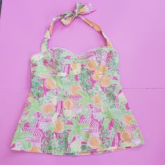 Lilly Pulitzer Juice Bar Blouse. Size 4. Tropical Vibes. Ties In The Back, Zipper Also In The Back. Pre Owned Looks Brand New! In Great Condition. Cute Fitted Sleeveless Blouse, Lined Summer Vacation Top, Lined Summer Top For Vacation, Lined Top For Summer Vacation, Summer Vacation Lined Top, Cute Fitted Tops For The Beach, Pink Sleeveless Halter Top For Beachwear, Retro Sleeveless Top For Beach Season, Pink Tops For Beach Season