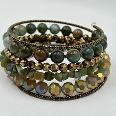 This Coil Wrap Bracelet Is Made With 6 Rows Of Gorgeous Gemstones Including Green Jasper And Serpentine, Faceted Glass Beads, And Large Sparkling Crystals On Silver Memory Wire Memory Wire Jewelry, Memory Wire Wrap Bracelets, Beaded Memory Wire Bracelets, Beaded Memory Wire, Wire Bracelets, Memory Wire Bracelet, Green Jasper, Wire Wrapped Bracelet, Beaded Wrap Bracelets