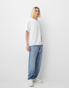 Straight fit ’90s jeans - Jeans - Men | Bershka Casual Straight Fit Summer Jeans, Straight Fit Jeans For Streetwear In Spring, Straight Fit Jeans For Spring Streetwear, Light Wash Casual Cropped Jeans For Streetwear, Casual Straight Fit Cropped Jeans In Rigid Denim, Cotton Tapered Leg Cropped Jeans For Streetwear, Casual Light Wash Cropped Jeans For Streetwear, Cotton Cropped Jeans With Tapered Leg For Streetwear, Casual Straight Hem Jeans For Streetwear