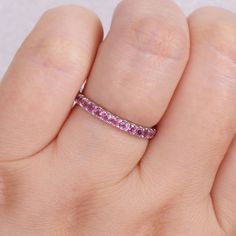 Featuring a series of beautiful pink tourmaline stones, this 10k white gold eternity ring offers a fun and gorgeous touch to any outfit. Featuring a series of beautiful pink tourmaline stones, this 10k white gold eternity ring offers a fun and gorgeous touch to any outfit.Click on this JEWELRY & WATCHES GUIDE to learn about fit, styles, materials and more! Width: 2.5 mm Metal: 10k white gold Plating: rhodium Finish: polished Packaging: boxedSTONE DETAILS Stone type: pink tourmaline Total weight: Pink Round Eternity Band For Wedding, Gold Eternity Ring, Eternity Ring Gold, Tourmaline Stone, Pink Tourmaline, Eternity Ring, Gold Plating, Tourmaline, Gold Plate