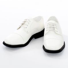 This pair of derby style shoes was created to create instant impact and charisma with his polished and soft texture. This wingtip oxford style lace-up dress shoe is perfect for any formal event. You can't go wrong with those. *As these styles of shoe tend to run larger than most regular footwear, dolce vita MEN please requests that you size down a half size (or a whole size where half is not available) to get the best fit. White Dress Shoes With Brogue Detailing For Spring, Fitted White Oxfords For Spring, Classic White Cap Toe Oxfords, White Oxfords For Spring, White Oxford Dress Shoes For Derby, White Plain Toe Oxfords For Spring, White Lace-up Formal Shoes For Spring, Spring White Lace-up Formal Shoes, Formal White Lace-up Shoes For Spring