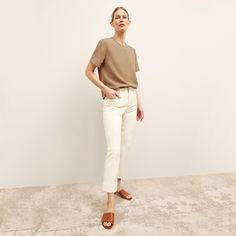 These cropped bootcut beauties will be your go-tos for days when you want to look effortlessly put-together. Adjustable hems give you extra versatility, while a hidden elastic in the waistband makes for maximum comfort. Made from a Turkish two-way stretch cotton that provides comfort, ease, and excellent recovery. This fabric is made from GOTS-certified organic cotton. Chic Summer Cropped Jeans With Five Pockets, Chic Cropped Jeans With Five Pockets For Summer, Spring Workwear Beige Flare Jeans, Chic Cropped Jeans With Five Pockets For Spring, Chic Summer Cropped Straight Leg Jeans, Chic Straight Fit Cropped Jeans For Spring, Chic Bottoms For Casual Gatherings In Fall, Versatile Flare Jeans For Spring, Classic Summer Workwear Jeans