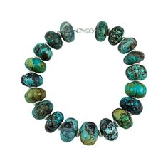 Sensational large Carved Natural Turquoise Beads Necklace inter-spaced with Sterling Silver rondelles, comprising nineteen turquoise rondelle shaped beads, each measuring approx. 32mm x 20mm, 35mm x 26mm, 36mm x 22mm etc… A show stopper that’s clearly perfect for dressing up your outfit! Rock Crystal Necklace, Vintage Turquoise Jewelry, Silver Ball Necklace, Vintage Beads Necklace, Turquoise Bead Necklaces, Statement Choker Necklace, Statement Choker, Sterling Silver Flowers, Beaded Necklaces