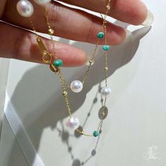 Highlight:   These 6-7 mm aurora-like Japanese Akoya pearls, affectionately known as 'rice pearls' due to their small size and rising popularity recently, are paired with untreated natural turquoise stones. This charming combination evokes a young maiden's youthful and graceful allure, embodying elegance in every detail. Product Information OriginJapan MaterialAkoya Pearl, 18k Gold, and Natural Turquoise DimensionsNecklace Length Adjustable 44-45 cm  Pearl Shaped: Round Size: 6-7 mm Quality: AAA Nacre: Very Thick Color: White  Luster: Aurora  Accessories Metal: 18k Gold Other: Natural Turquoise Turquoise Pearl Necklace Gift, Turquoise Jewelry With Pearl Chain And Round Beads, Elegant Turquoise Pearl Necklace With Gemstone, Elegant Turquoise Pearl Necklace With Round Beads, Turquoise Pearl Necklace With Round Beads, Elegant Turquoise Necklace With Pearl Chain, Elegant Turquoise Pearl Necklace, Elegant Turquoise Pearl Bracelet For Gift, Elegant Turquoise Necklace With Pearl Drop