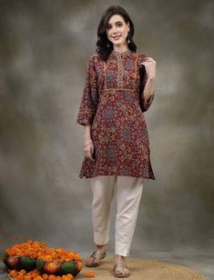 * Rust Printed Mirror Work Kurti Printed Kurti / Embroidered Short Kurti / Indian Tunic / Summer-Spring Evening Dress / Cotton Tunic Tops * Rust straight kurti * Woven design printed * Mandarin collar, three-quarter, regular sleeves * Mirror work detail * Fabric:-  Rayon  * Package Contains:-   Only One Kurti *Wash Care:- Hand Wash AVAILABLE IN 6 SIZES THEY ARE IN FOLLOWING MEASUREMENTS IN INCHES:- XS:- Bust-34/Waist-26/Length-36 S:- Bust-36/Waist-28/Length-36 M:- Bust-38/Waist-30/Length-36 L:- Mirror Work Kurti, Printed Mirror, Ethnic Kurti, Kurti Top, Tunic Tops Summer, Women Tunic, Cotton Tunic Tops, Indian Tunic, Straight Kurti