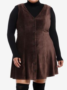 Make room for the cozy cottage dress of your dreams! This brown corduroy dress has a V-neckline and features buttons down the front. Perfect for layering over a cozy long-sleeve! Shirt not included.95% polyester; 5% spandexWash cold; dry lowStretchy materialImportedModel is 5'10"Model wears size 1 Simple Dress Plus Size, Gathered Bust Dress, Christmas Plus Size Outfits, 2xl Women Plus Size Outfits, Plus Size Dark Academia Fashion, Nonbinary Fashion Feminine, Brown Sweater Dress Outfit, Plus Size Fall Dresses, Corduroy Dress Outfit