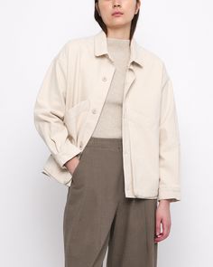 A shirt jacket with a utilitarian touch. Features a paneled construction, spread collar and button placket. The design is anchored by two oversized gusseted side pockets. Relaxed fit. A staple for transitioning seasons. + Details Color: Off-White 100% Cotton XS, S, M, L, XL Julie is 5’9” and wearing a XS Hand wash cold, lay flat to dry. Can be machine washed cold. Do not tumble dry. Can be dry cleaned. + Material A sturdy heavyweight cotton twill reminiscent of workwear canvas. Resilient and eas Knitwear Dress, Pocket Shirt, Signature Collection, Button Placket, Signature Style, Lay Flat, Shirt Jacket, Cotton Twill, Work Wear